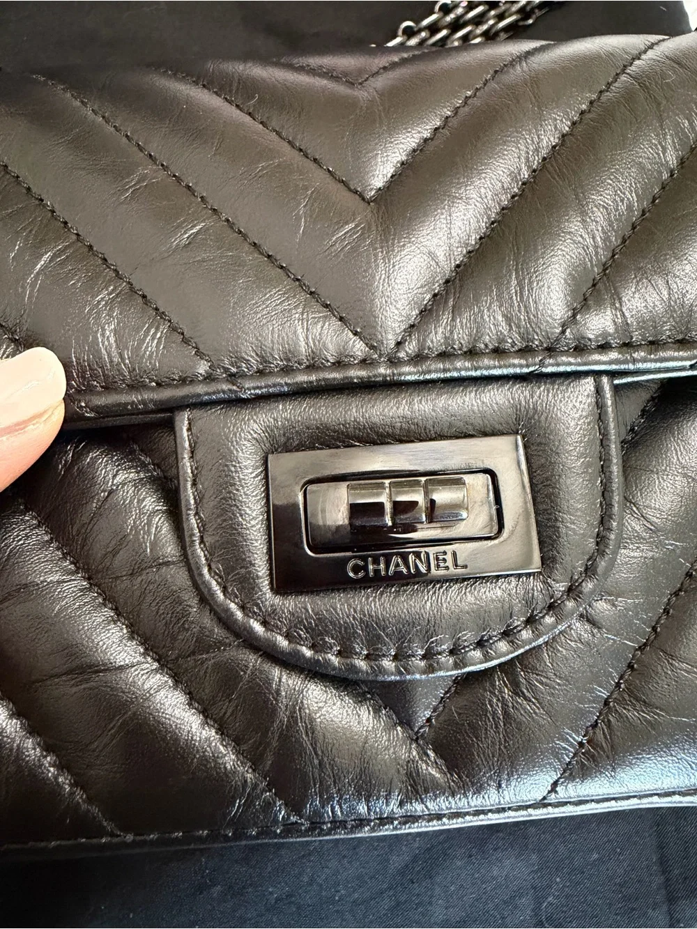 CHANEL SO BLACK REISSUE 2.55 FLAP CHEVRON AGED CALFSKIN MINI